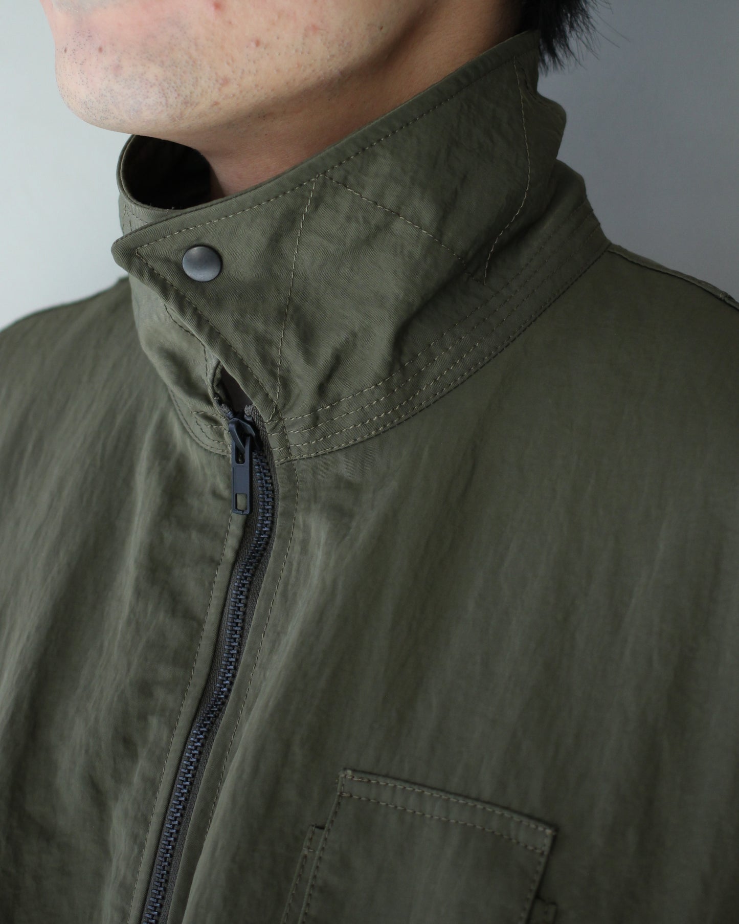 ssstein/BIO WASHED NYLON OVERSIZED FIGHT JACKET "MILITARY KHAKI"