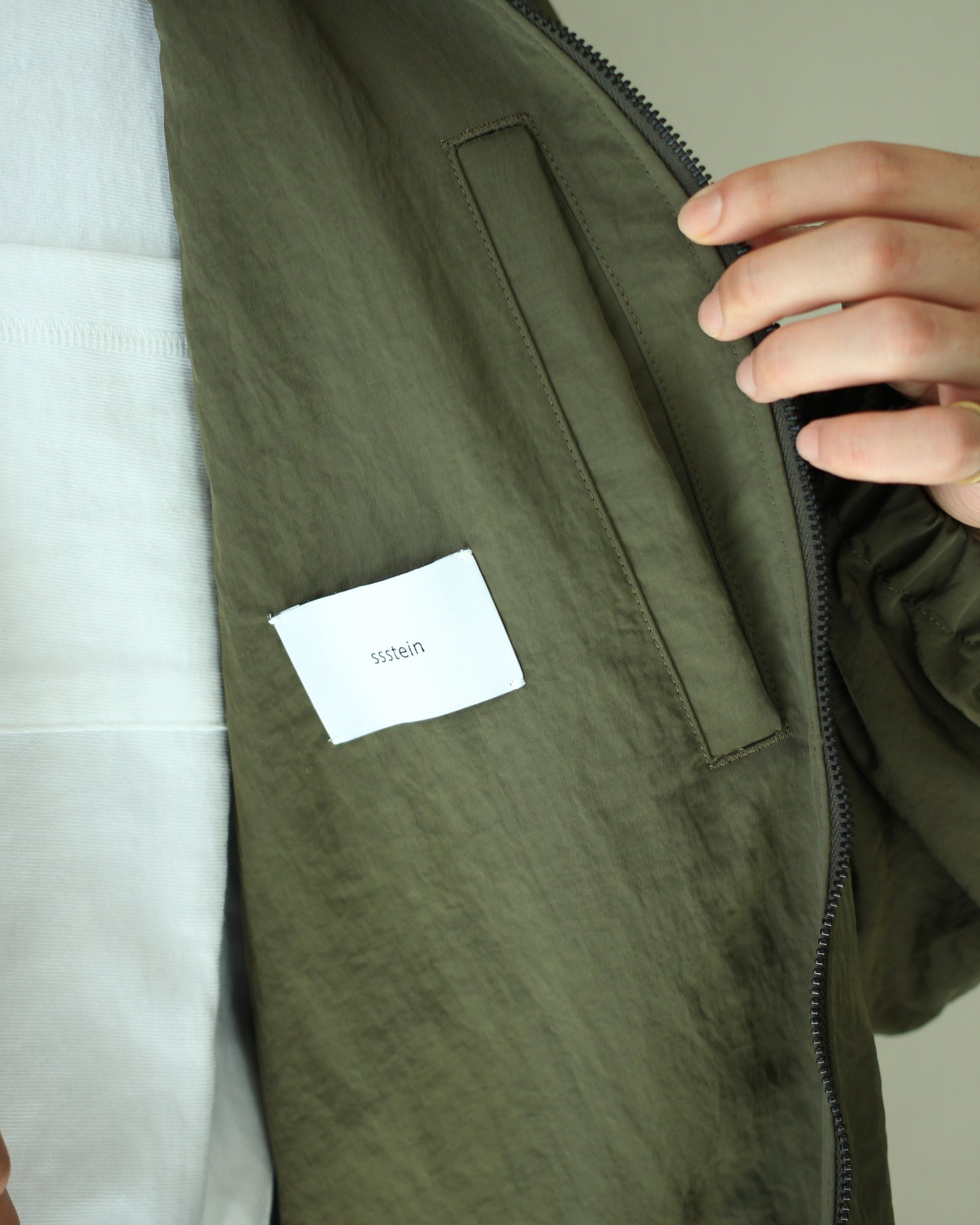 ssstein/BIO WASHED NYLON OVERSIZED FIGHT JACKET "MILITARY KHAKI"