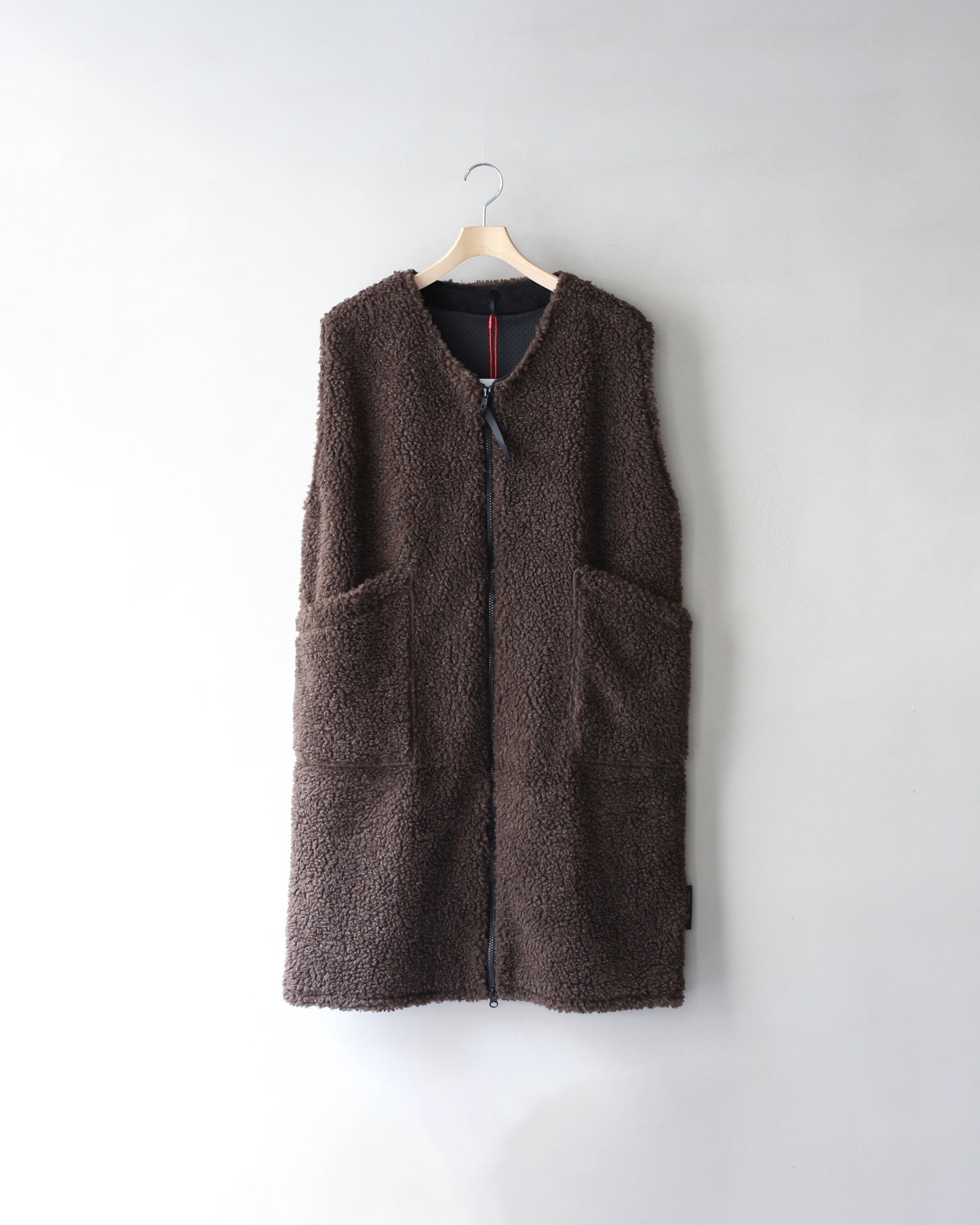 FARFIELD （ファーフィールド） / LONG VEST "DK,Brown Fleck"