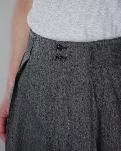 ULTERIOR/WOOL WASHI HERRINGBONE TUCKED TROUSERS "BLACK"