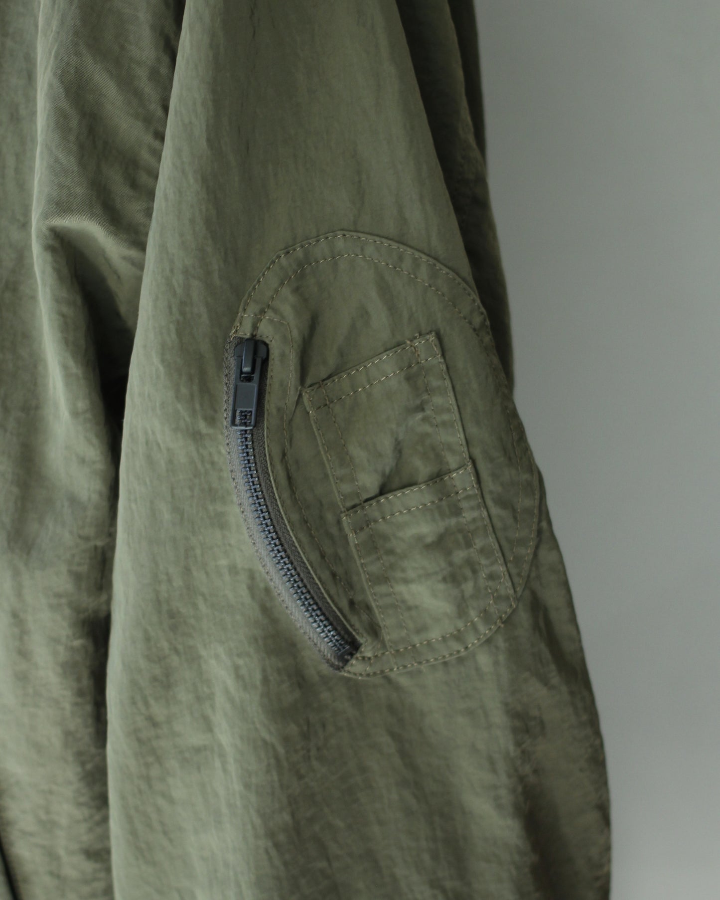 ssstein/BIO WASHED NYLON OVERSIZED FIGHT JACKET "MILITARY KHAKI"