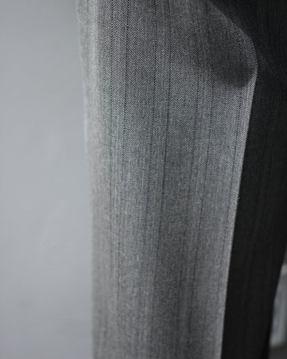 ULTERIOR / MELANGE HERRINGBONE STRIPE TUCKED TROUSERS"DUSTY GREY"